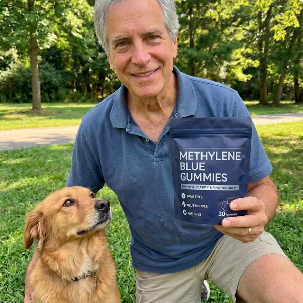 Edward U. holding product with dog