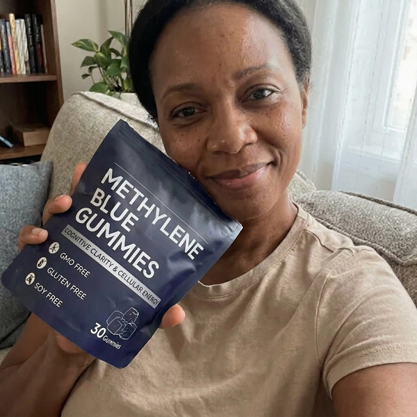Carla S. holding product
